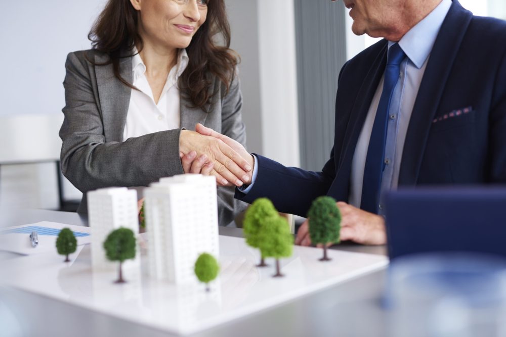 Close up of business partners shaking hands
